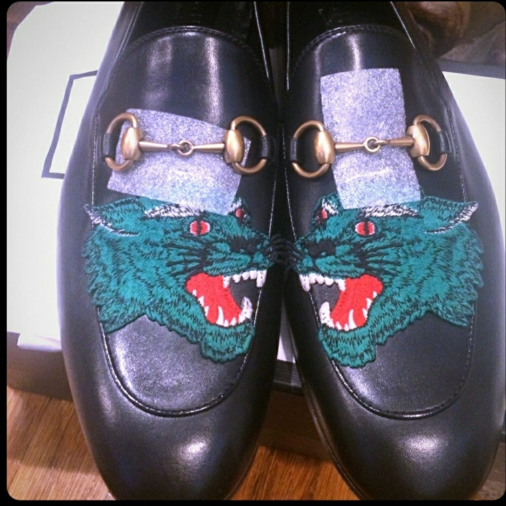 SOLD...GUCCI Brixton wolf-appliqué leather loafers
